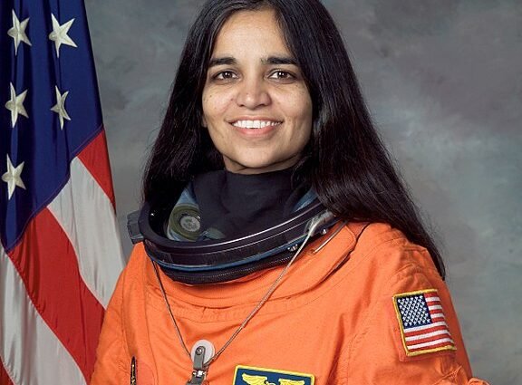 576px Kalpana Chawla NASA photo portrait in orange suit